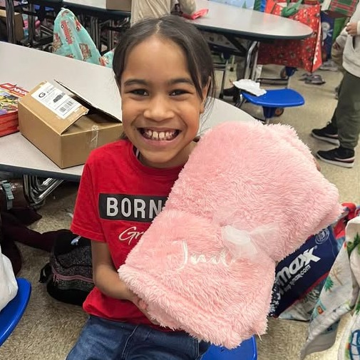 young female student with a new blanket