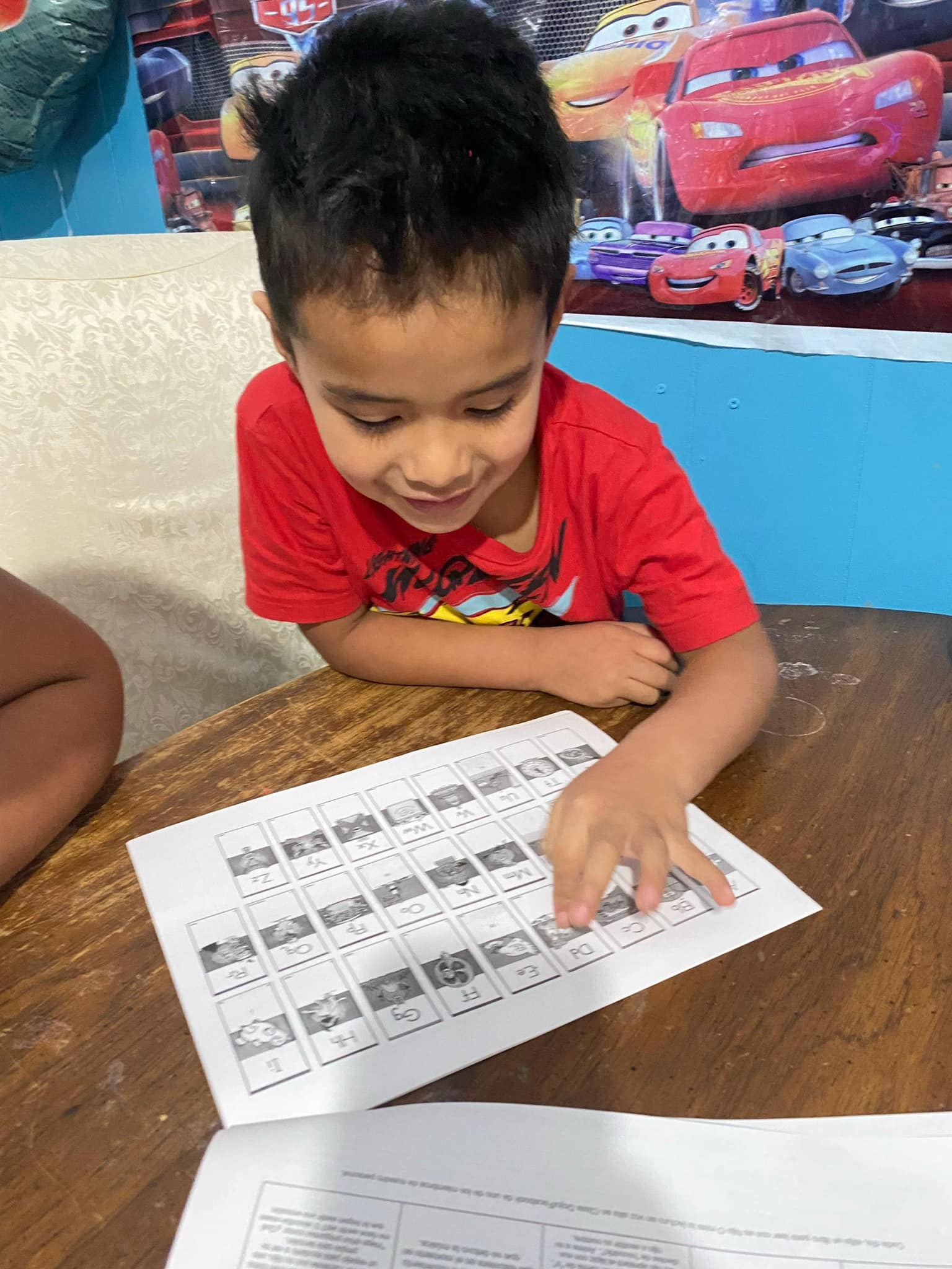 boy working on worksheet