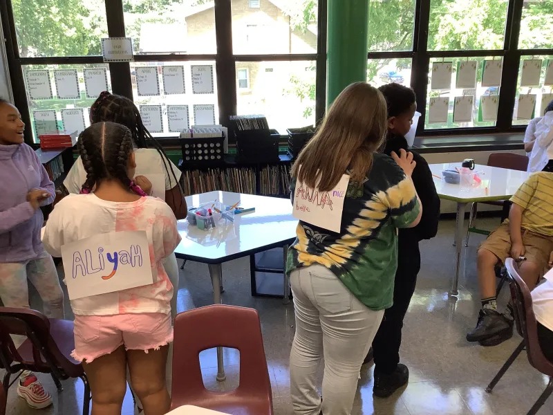 teacher teaching on classroom