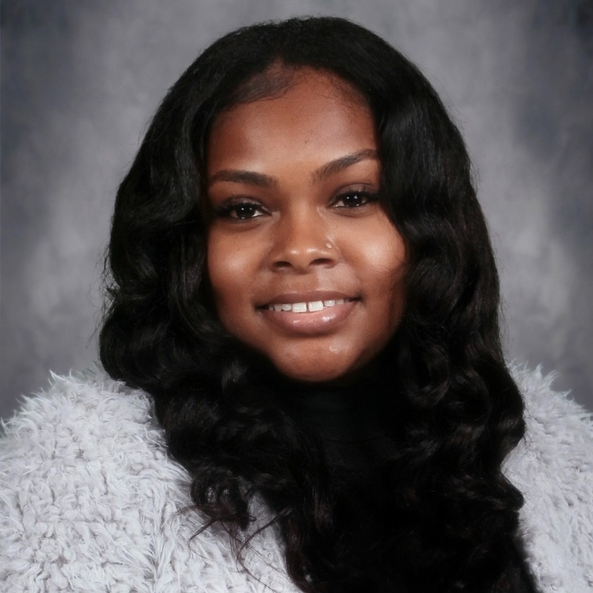 Ms. Kiya Bell