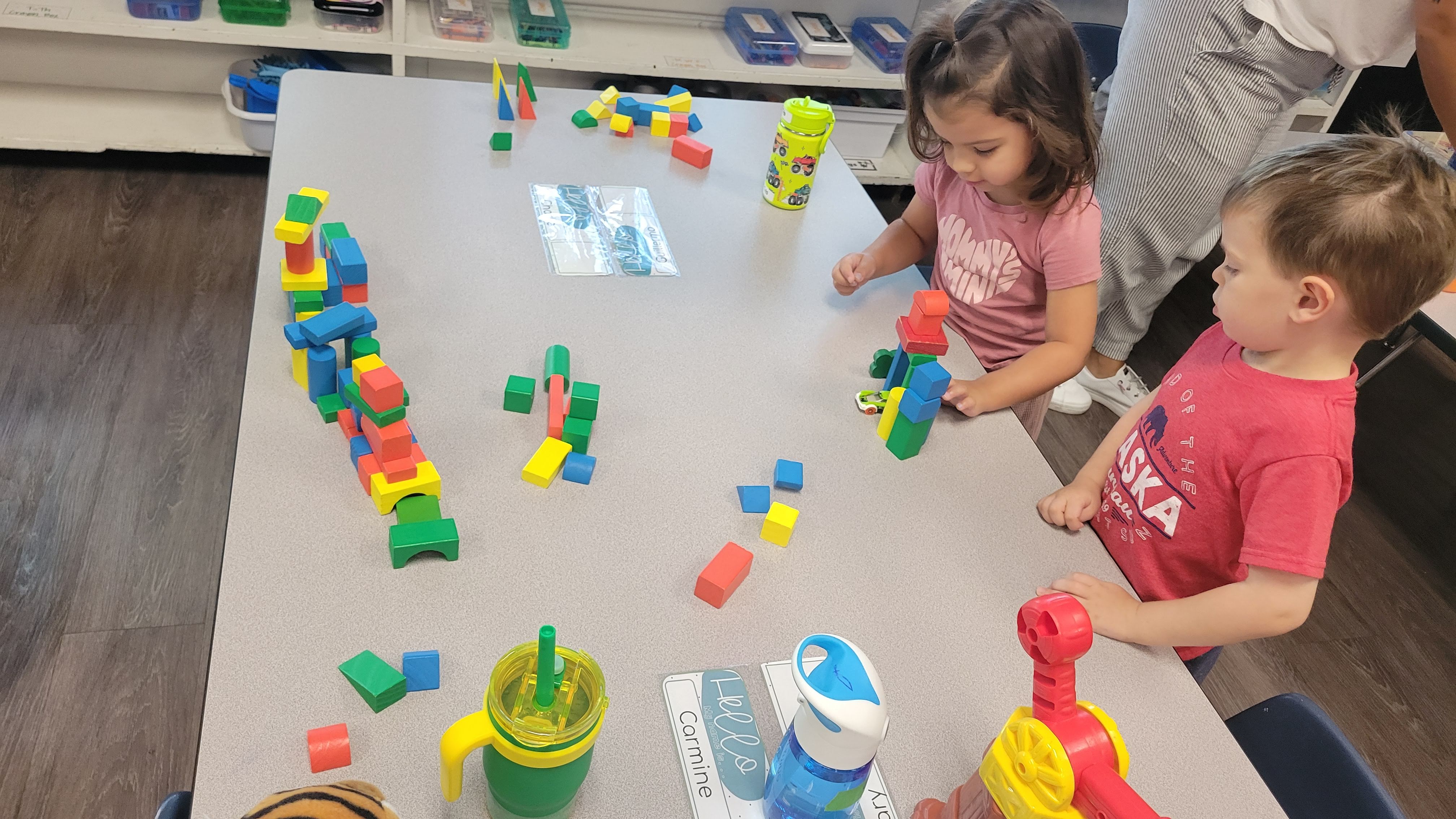 preschoolers playing and learning