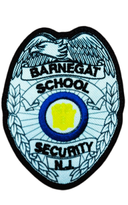 Security patch featuring the Barnet School emblem, symbolizing safety and protection within the educational environment.