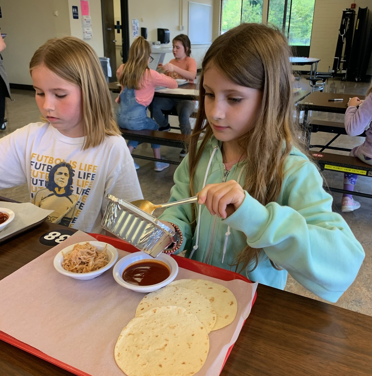 students making burritos