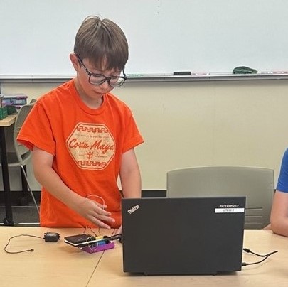 student building robot