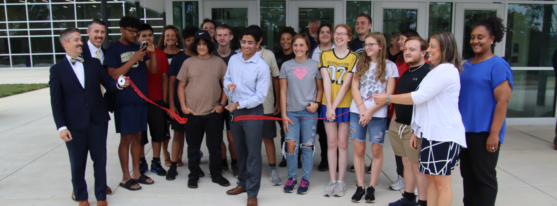 Students cutting a ribbon at the newly renovated CHS