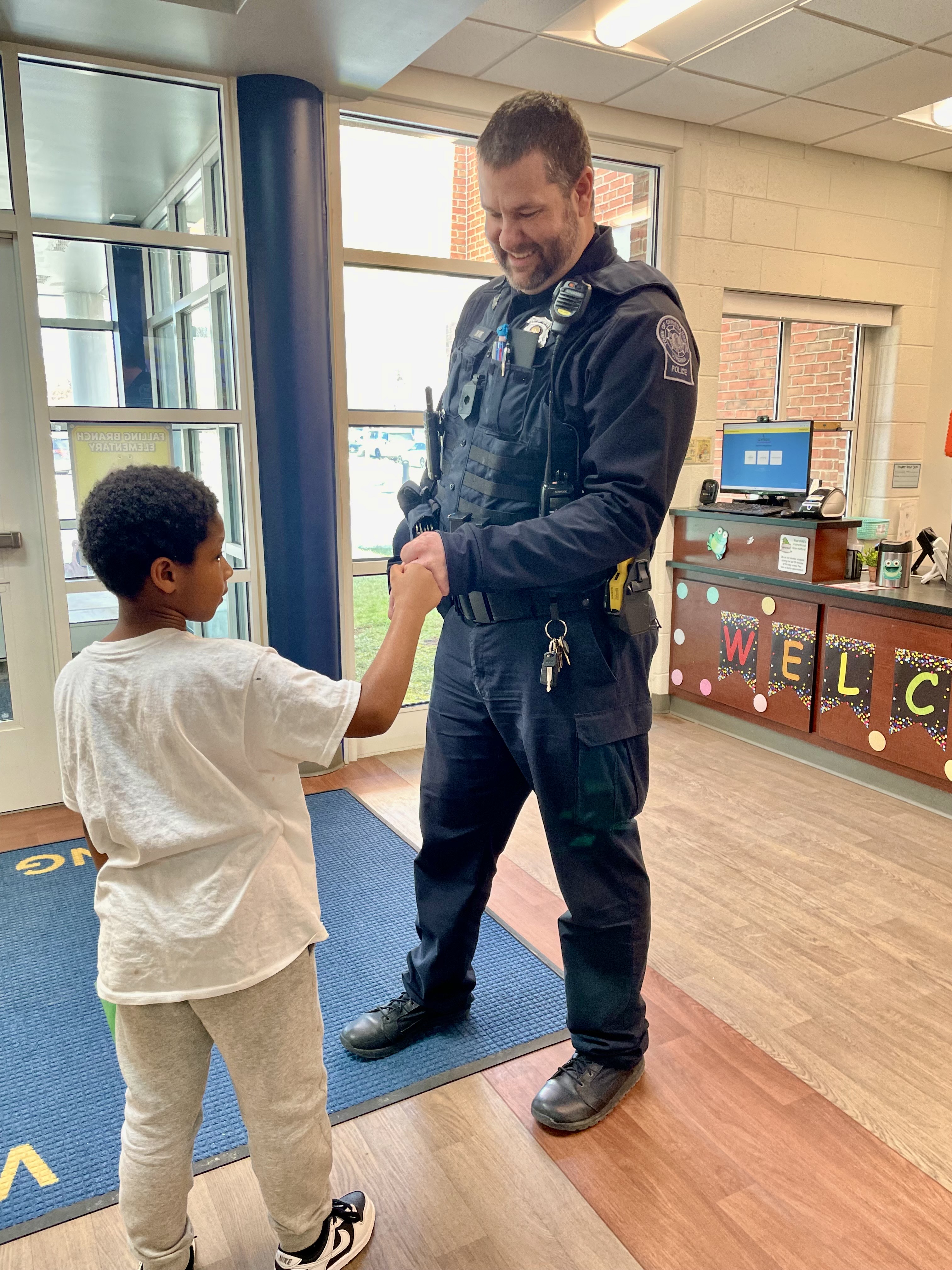 Officer Beane interacting with a student