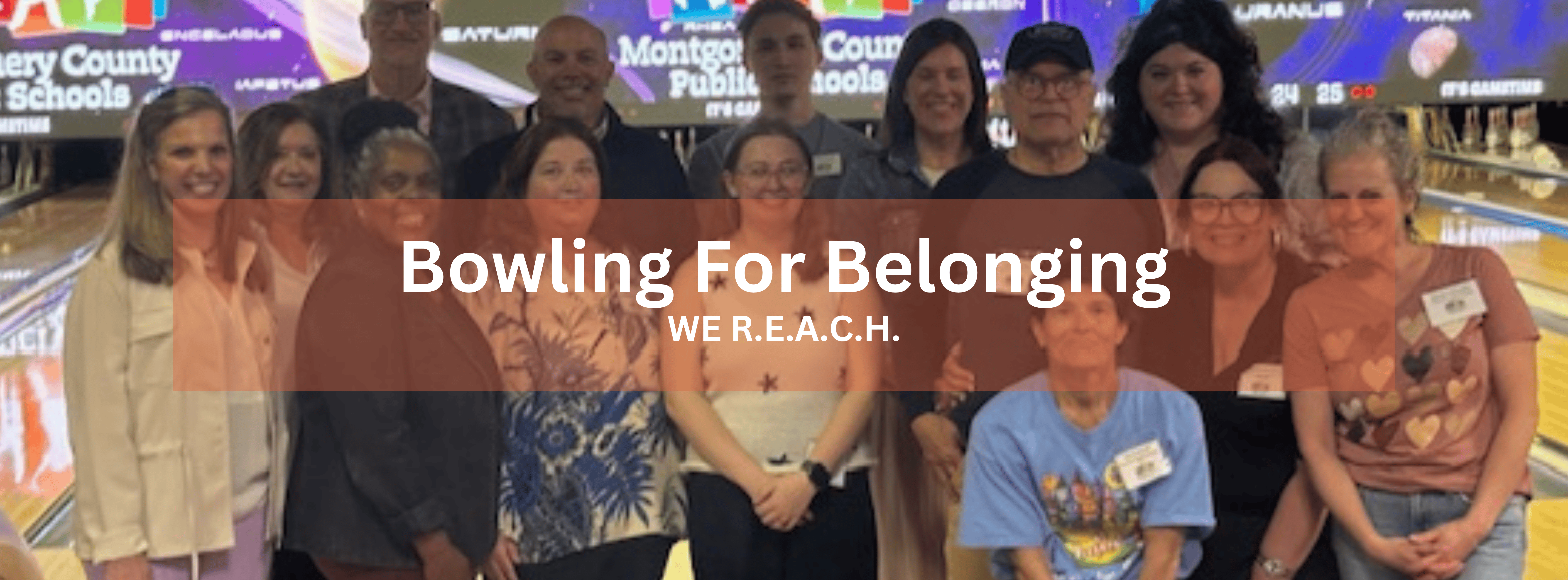 A large group of people smiling together at a bowling alley for a WE R.E.A.C.H. event titled "Bowling For Belonging."