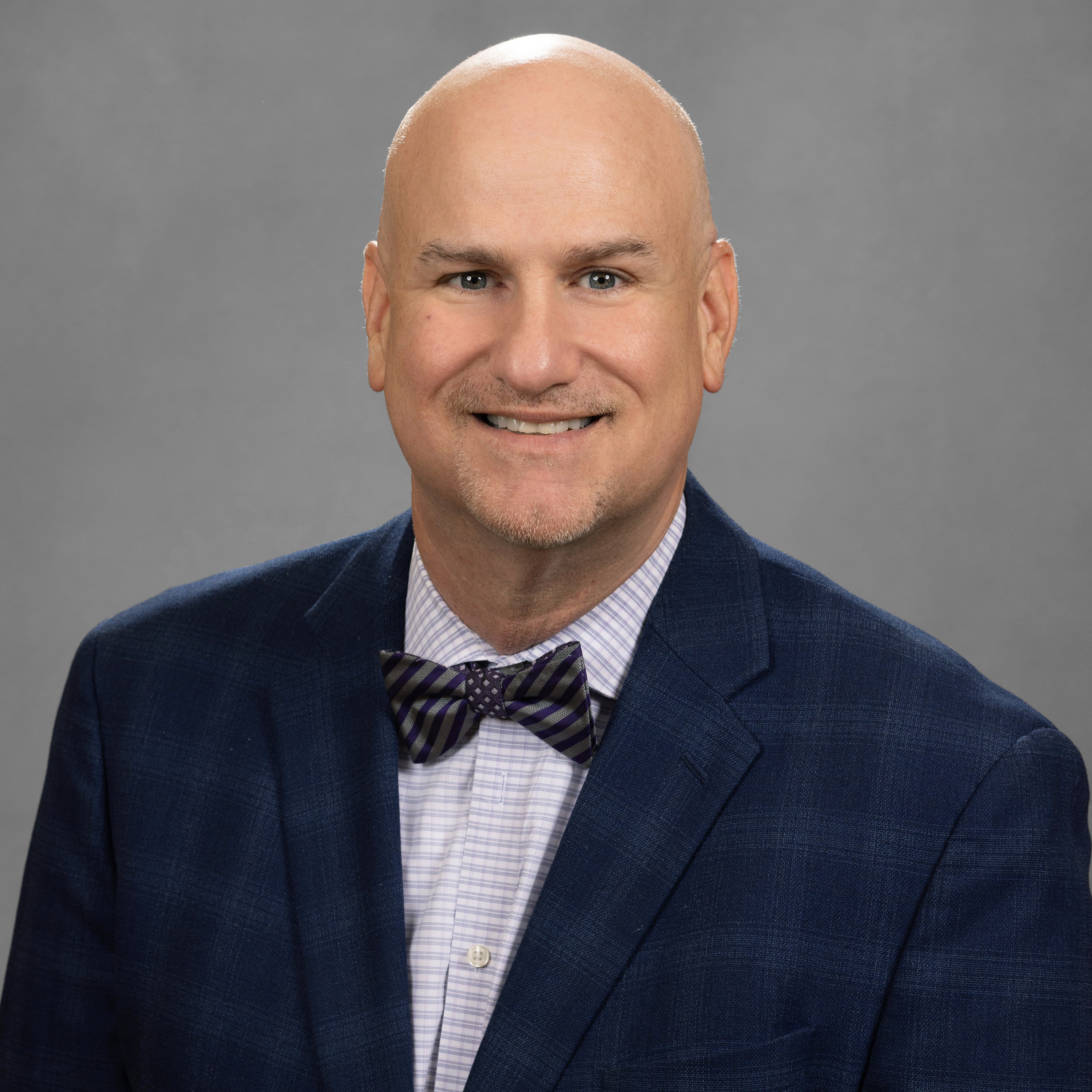 Dr. Tom Brewster