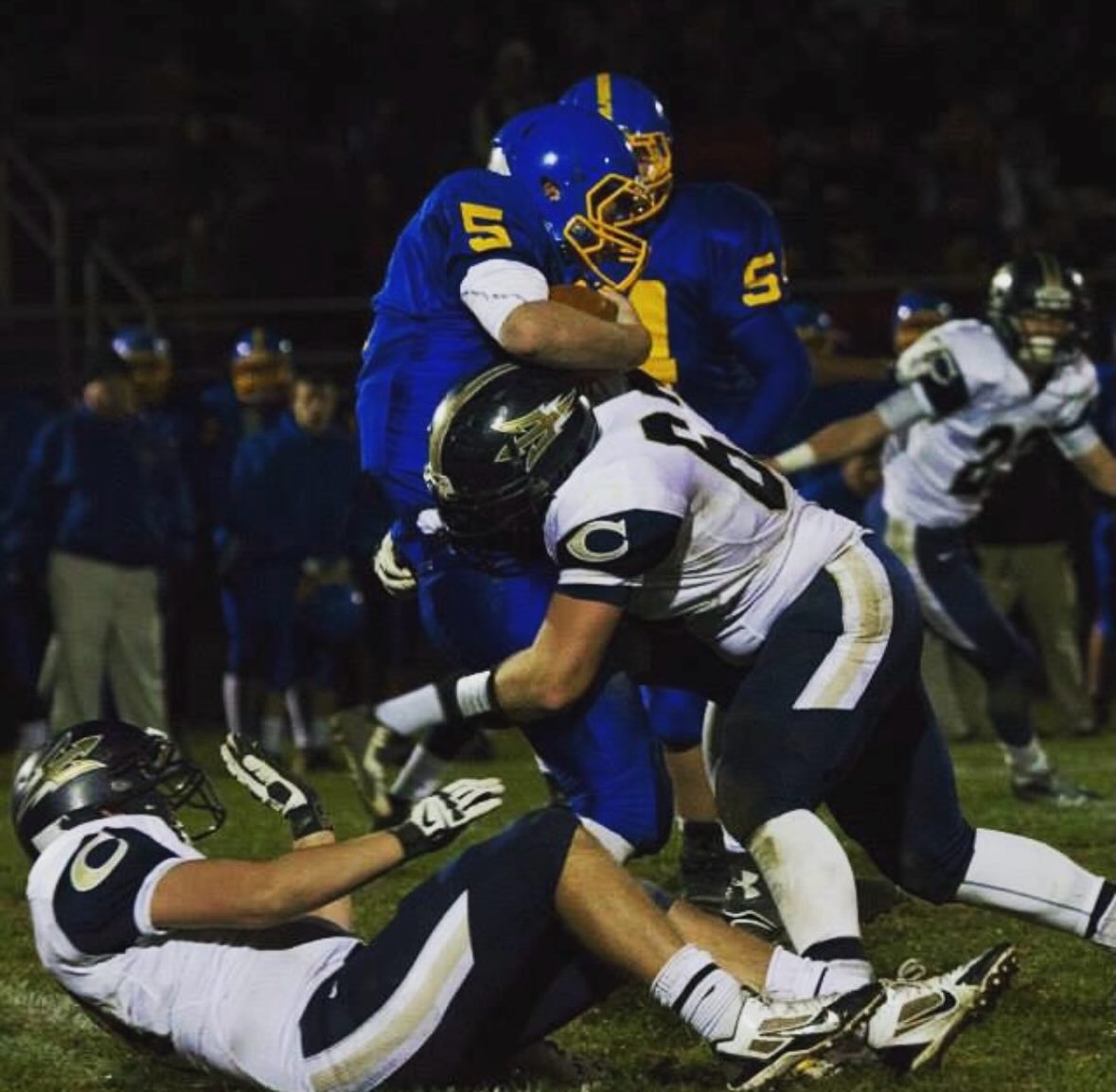 CHS Football Player tackling someone