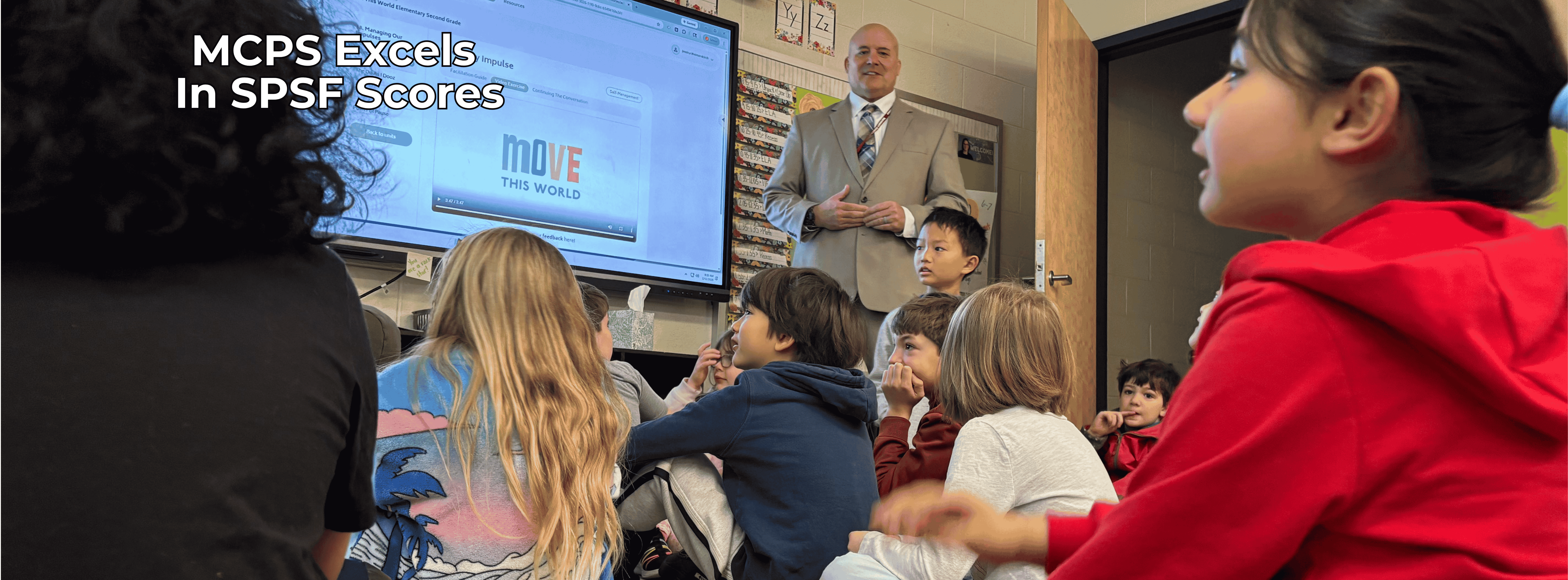 students in class with text "MCPS excels in SPSF scores"