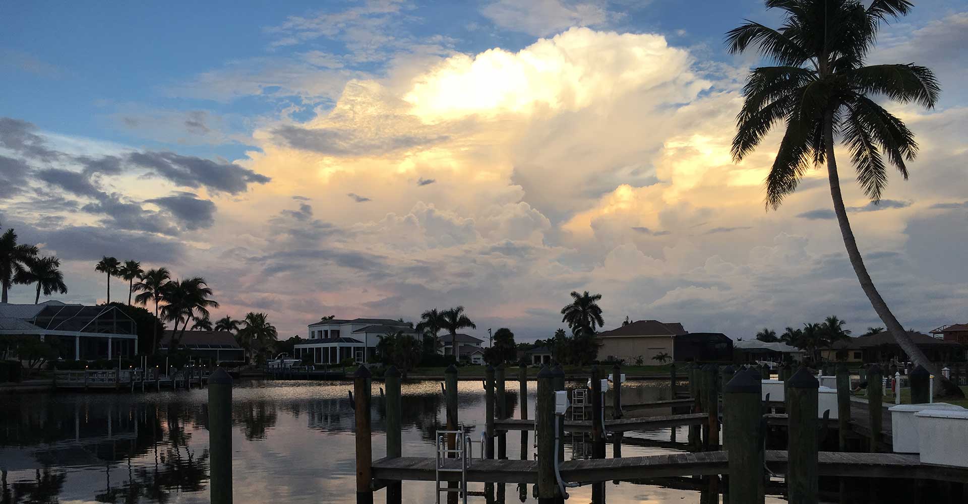 water front property and clouds.