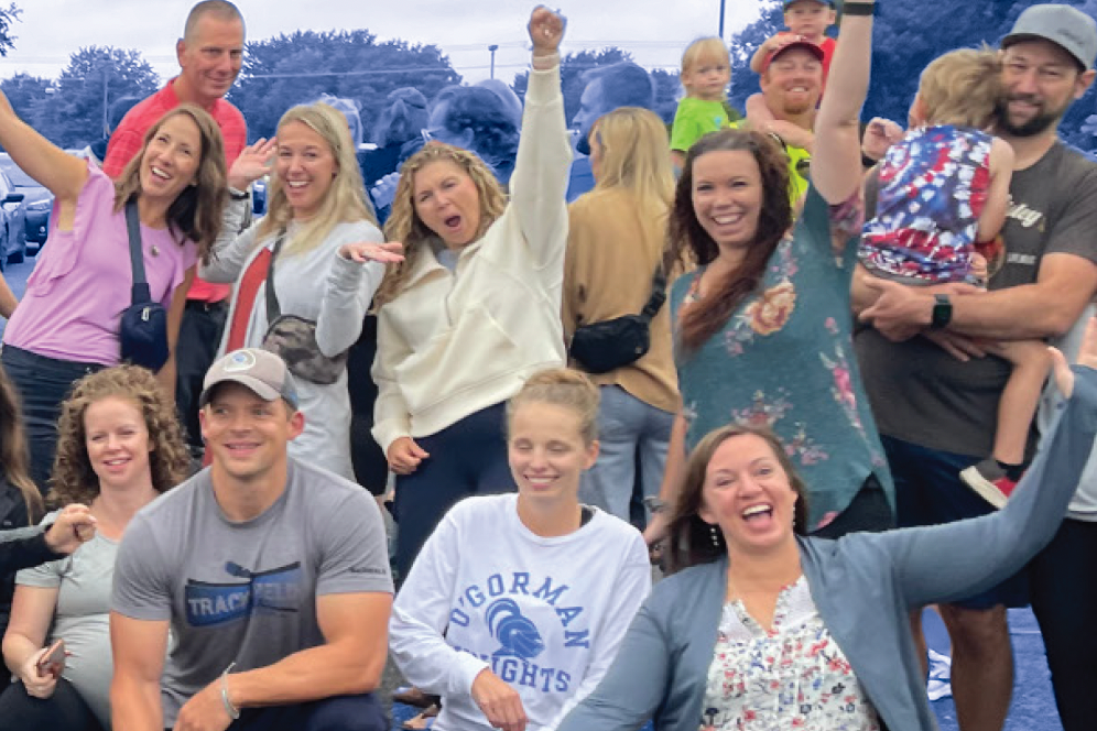 group of parents cheering