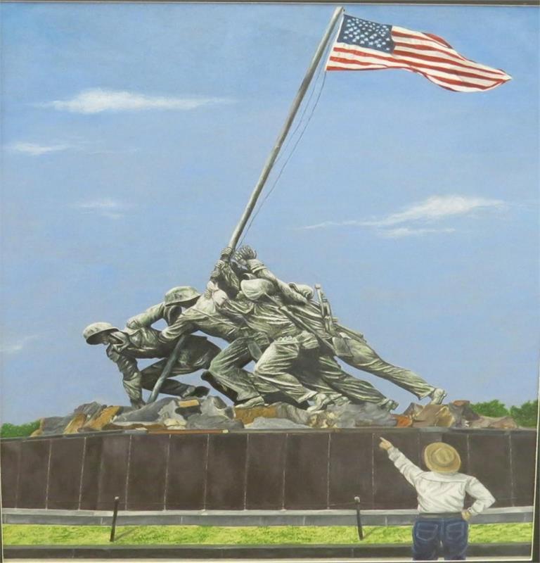 A child in a straw hat stands in front of the Iwo Jima Memorial, pointing towards the iconic statue of Marines raising the American flag, set against a clear blue sky.