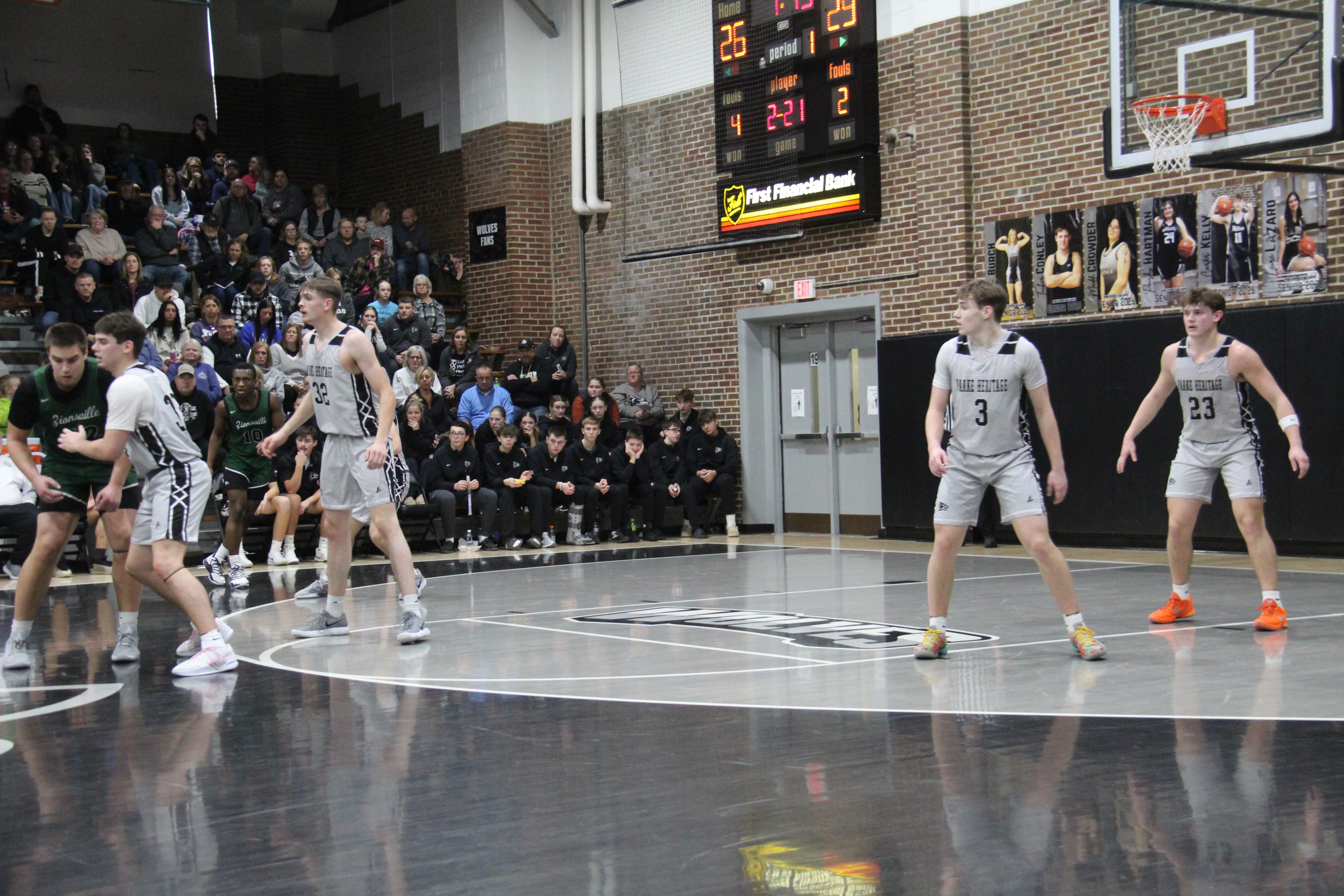 basketball players on the gym floor