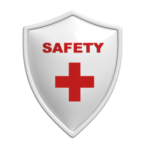A shield-shaped emblem featuring the word 'SAFETY' in bold red letters above a red cross symbol, set against a white background.