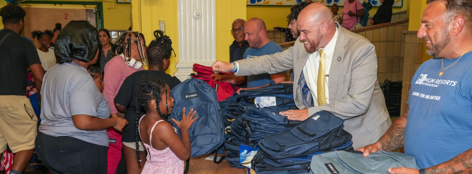 Mayor’s annual backpack and school supply giveaway, supported by donations from community businesses and organizations, with students  receiving new backpacks for the school year.