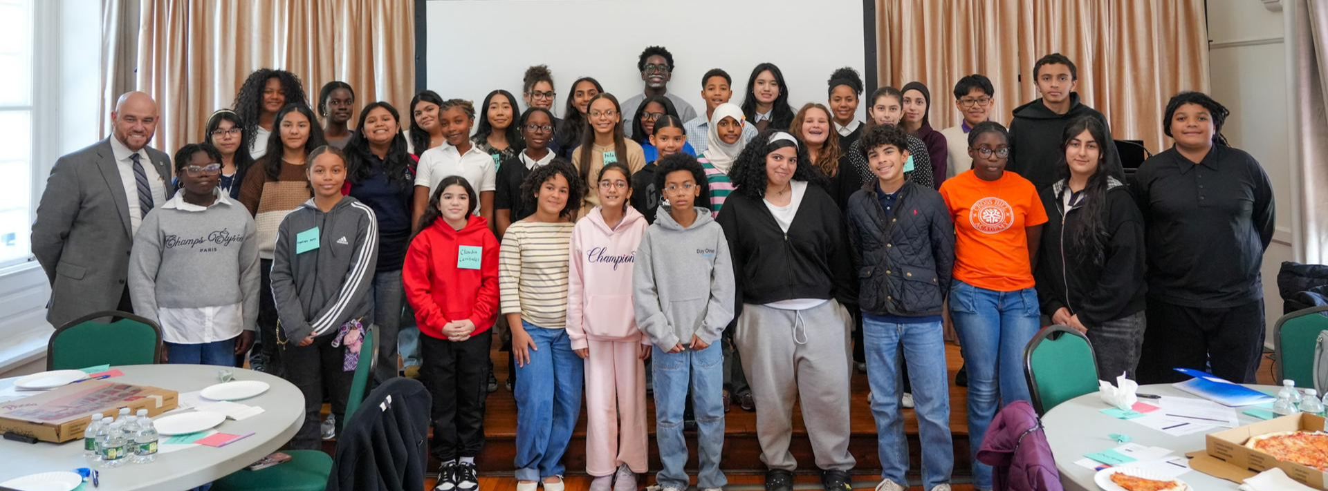 Superintendent of Schools Aníbal Soler, Jr., stands with members of the Superintendent’s Student Leadership Council for a group photo at Historic Philipse Manor Hall during their first meeting of the school year.