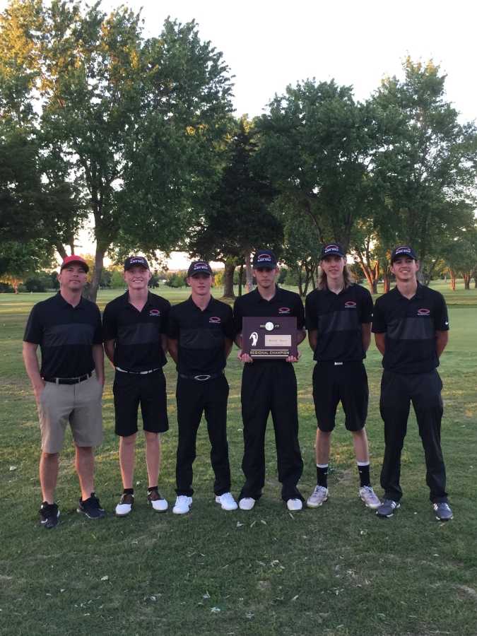 A group of six male golfers, dressed in black uniforms, stand together on a grassy area, holding a trophy, with trees in the background.