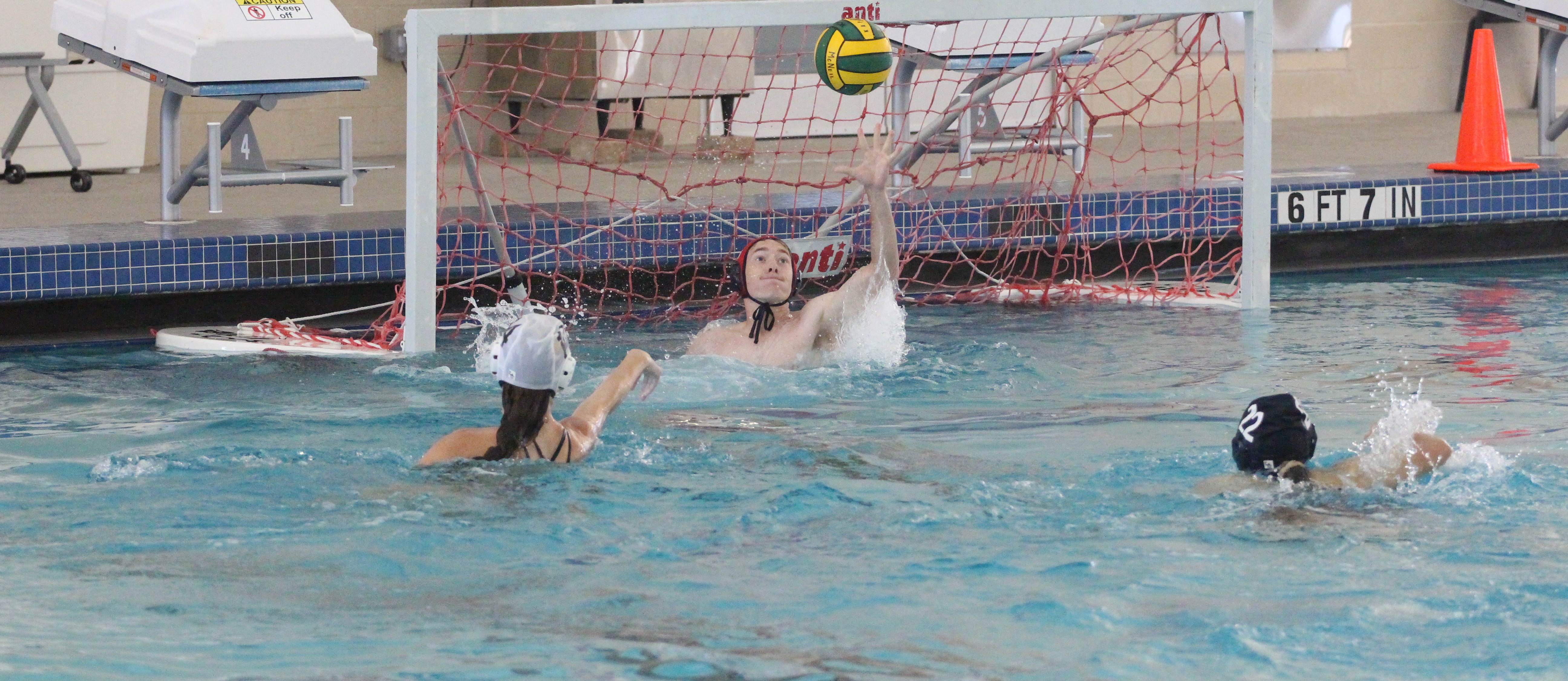 students playing water polo