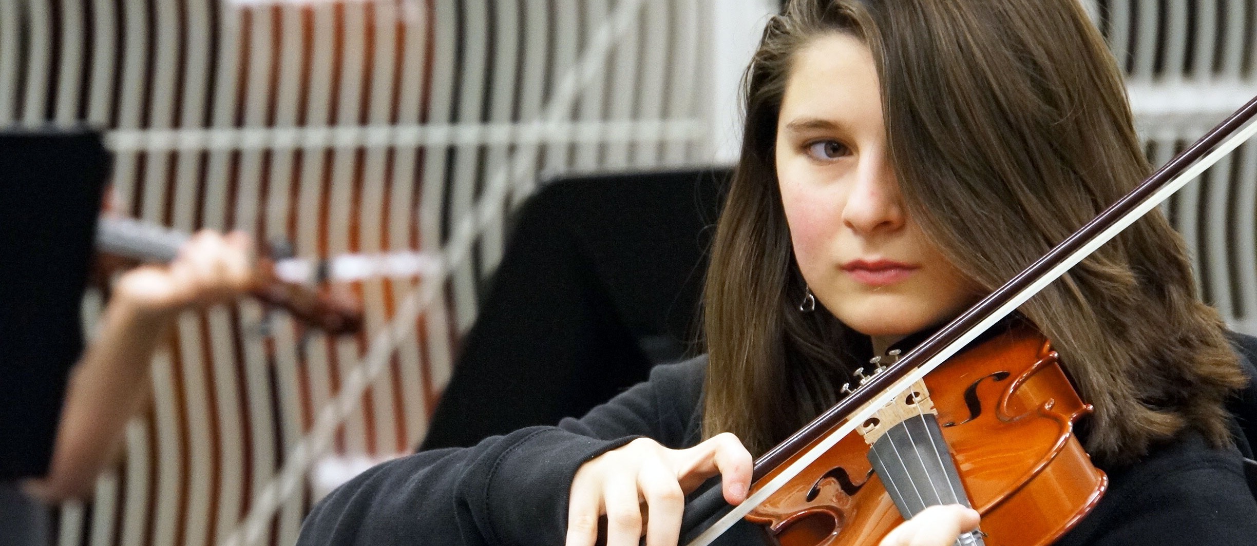Deerpark Middle School student playing the violin