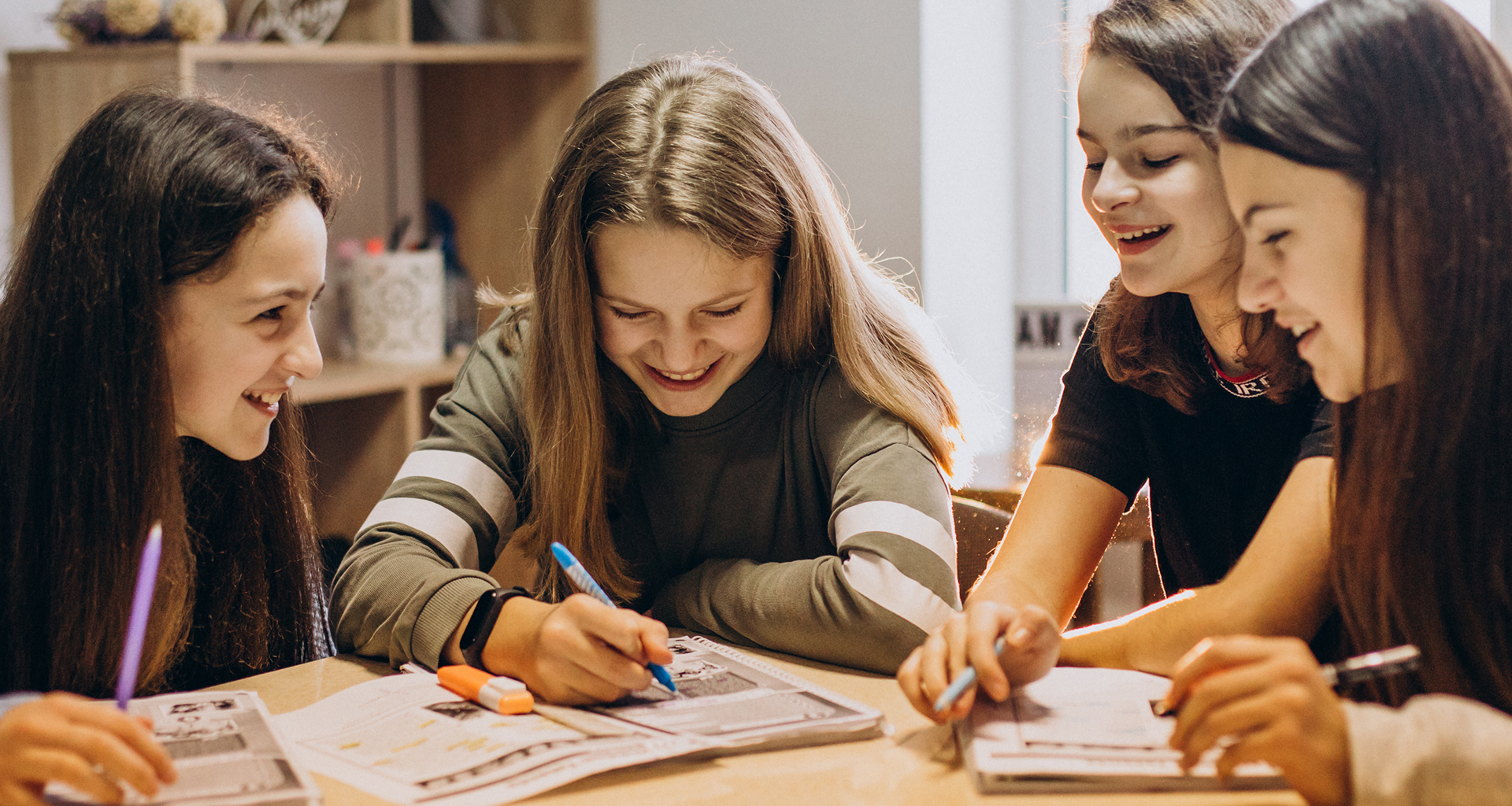 Four students working together