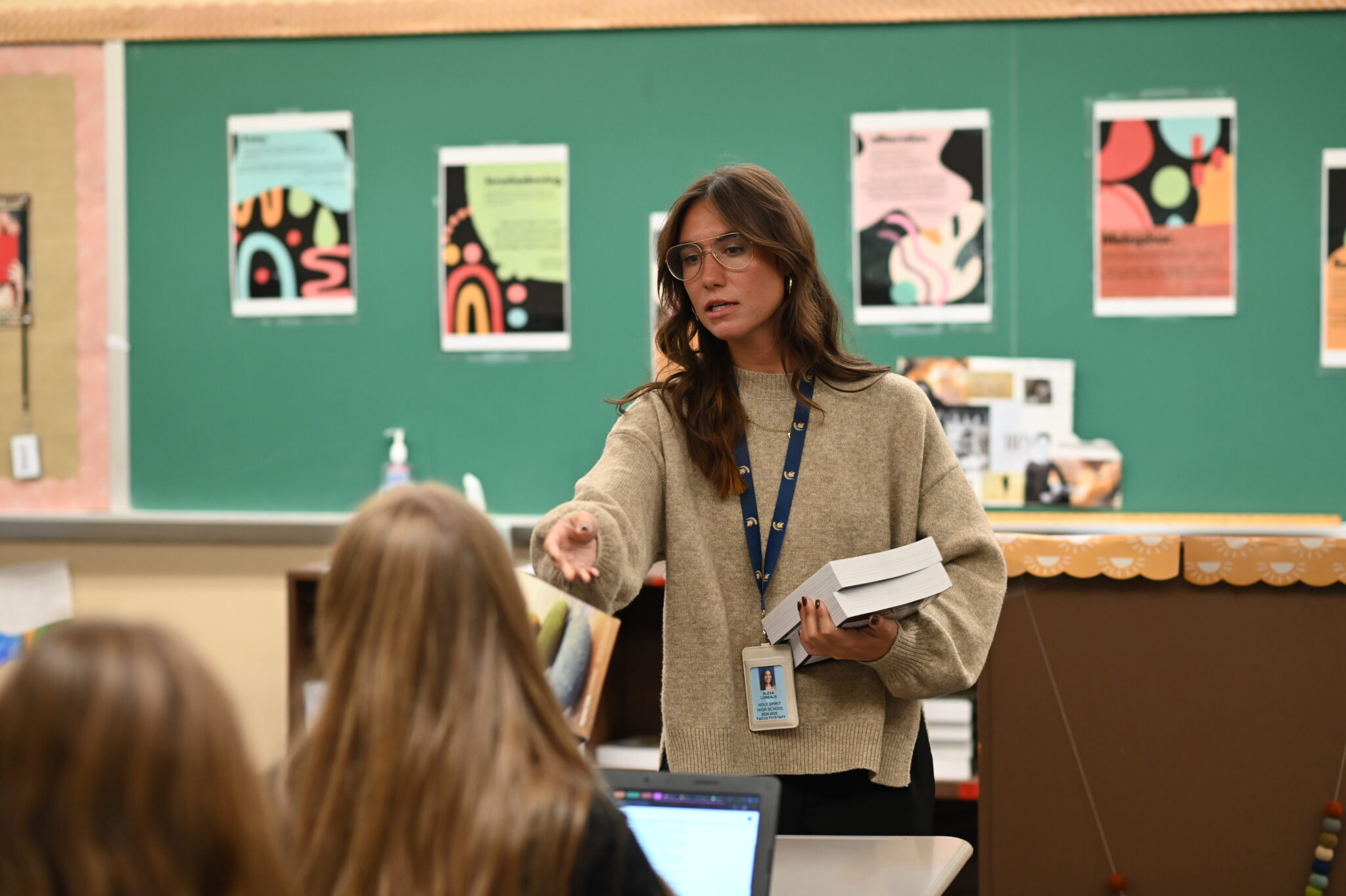 Holy Spirit High School teacher Alexa Loreaux, who teaches AP Language and Composition, instructs students during class.