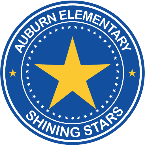 A circular logo featuring a large yellow star in the center, surrounded by the text 'AUBURN ELEMENTARY' at the top and 'SHINING STARS' at the bottom, all set against a blue background with white stars around the edge.