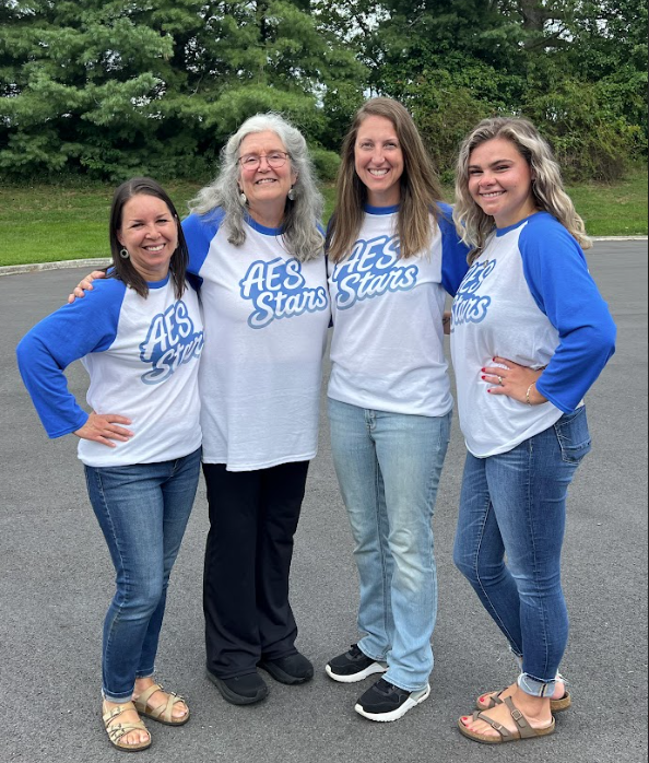 AES counselor team standing and posing