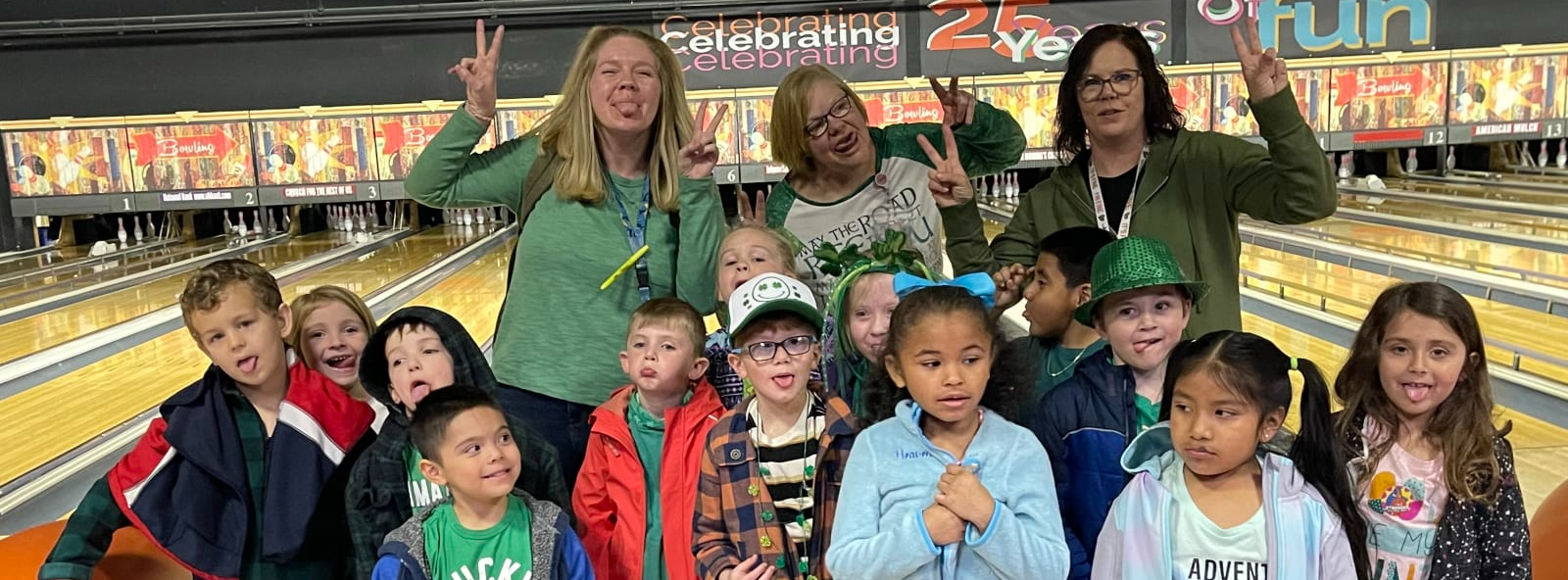 teachers and students smiling