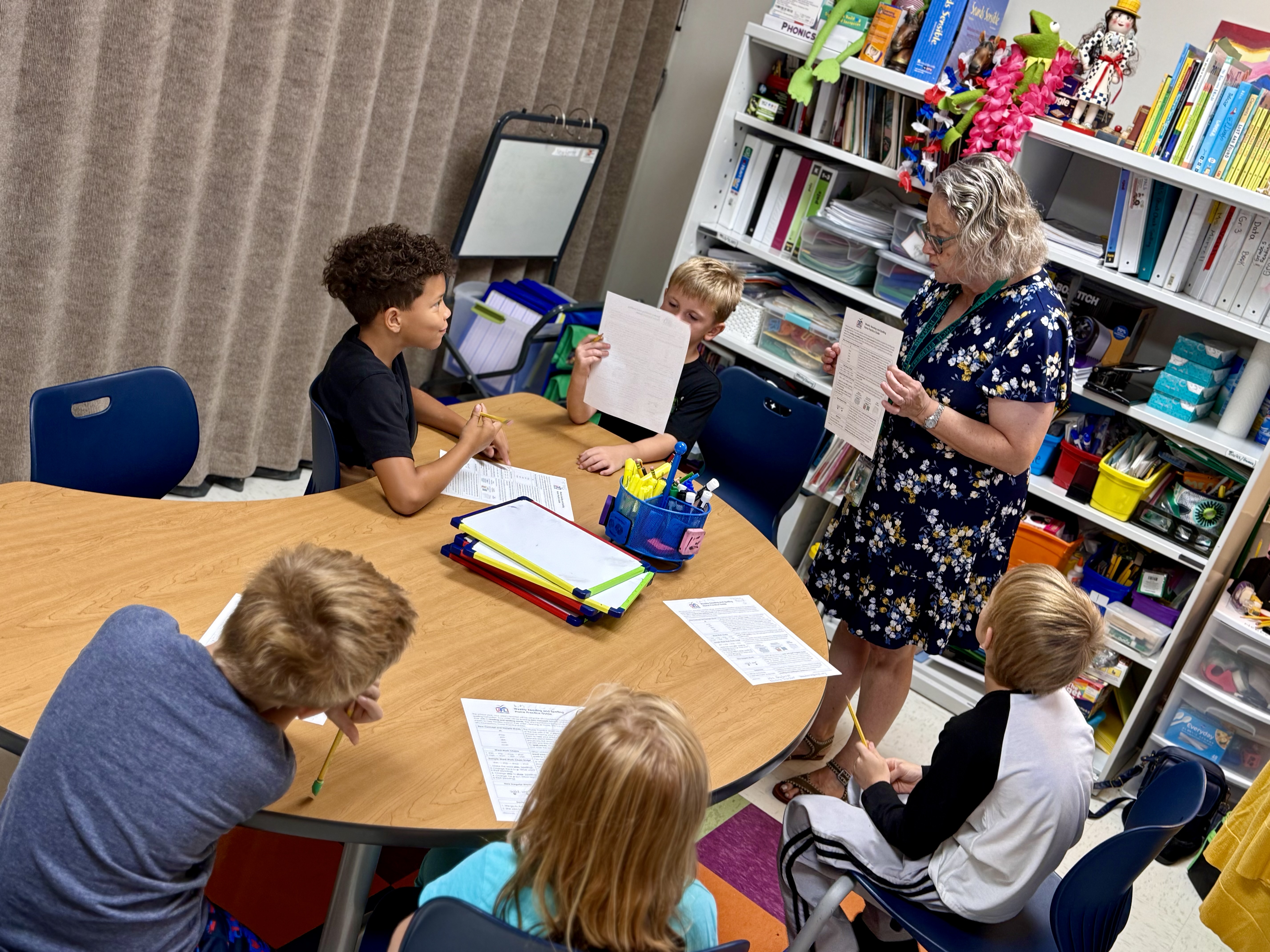 reading teacher with students