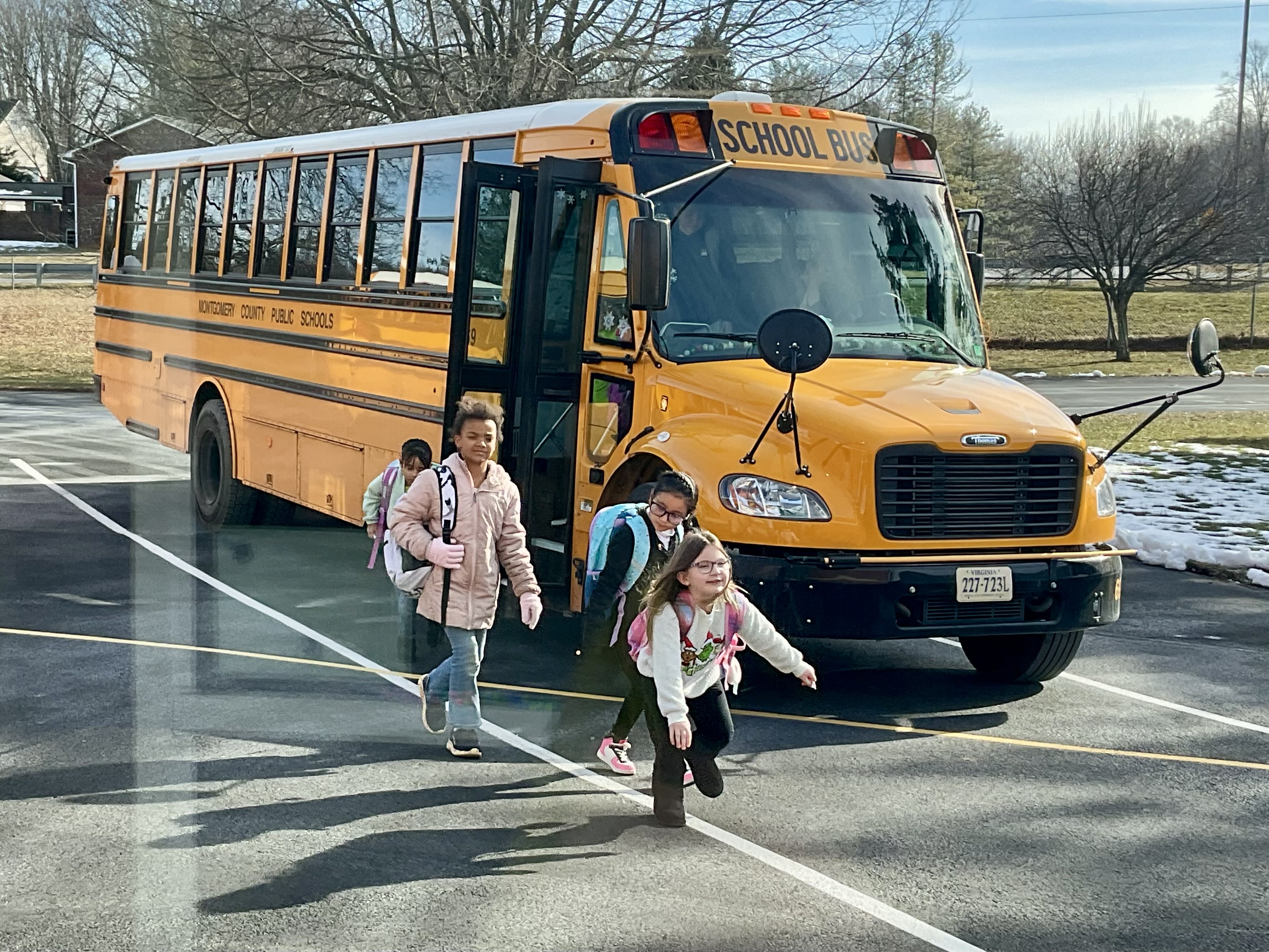school bus dropping off students