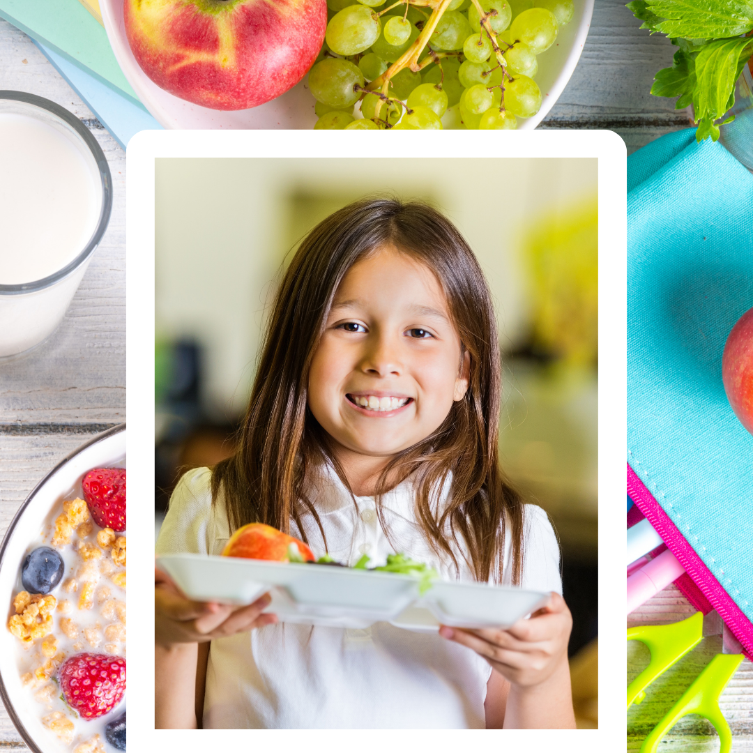 Girl smiling with plate of food