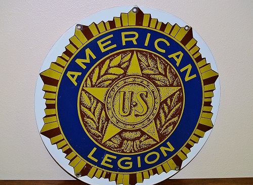 Metal sign featuring the American Legion emblem, symbolizing patriotism and veteran support.