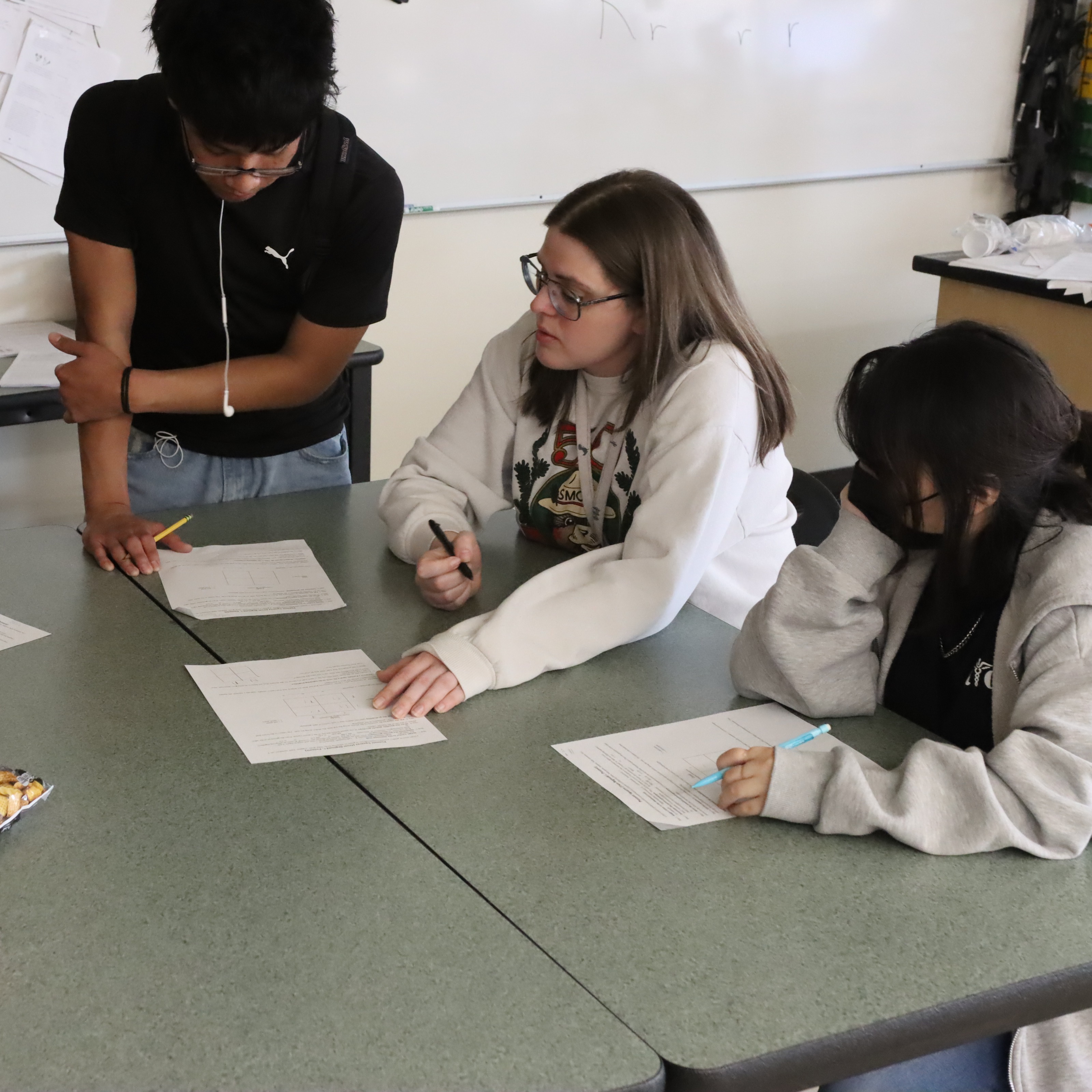 teacher intrucing students