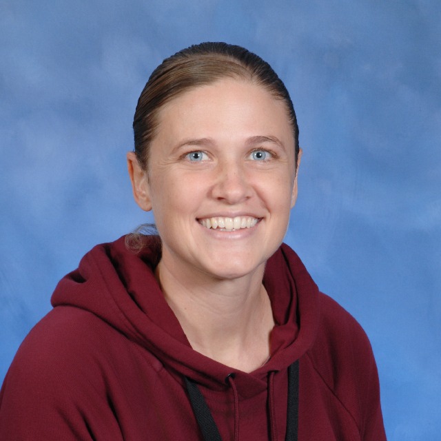 A woman in a red sweatshirt