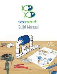 An illustrated build manual for a SeaPerch robot, featuring a partially assembled robot made of PVC pipes and a blue component, surrounded by tools and diagrams on a work surface.