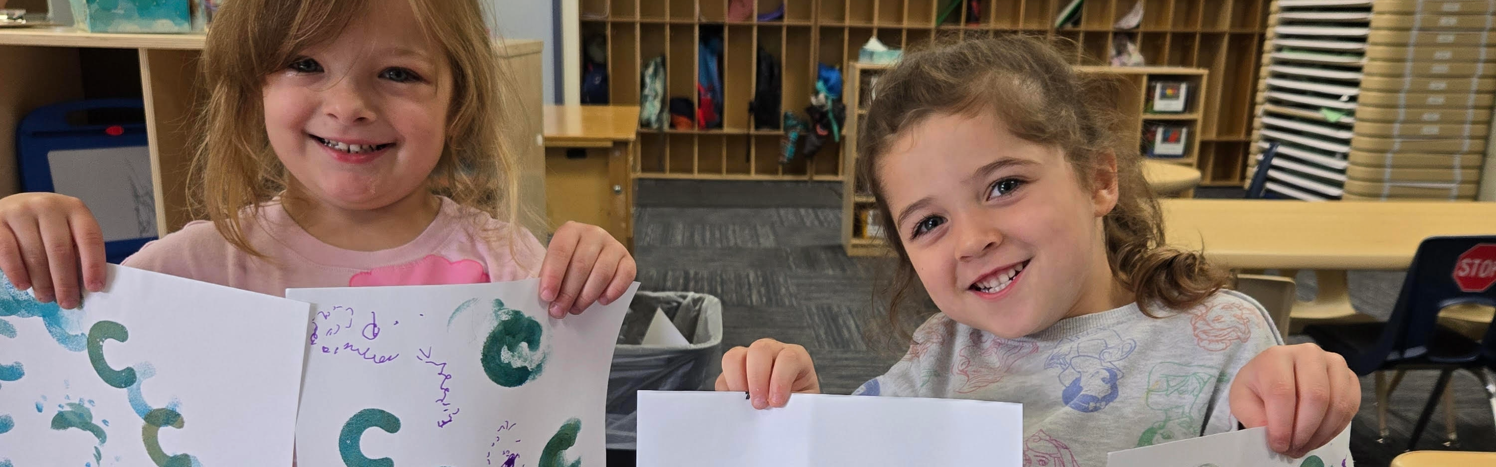 Students holding posters