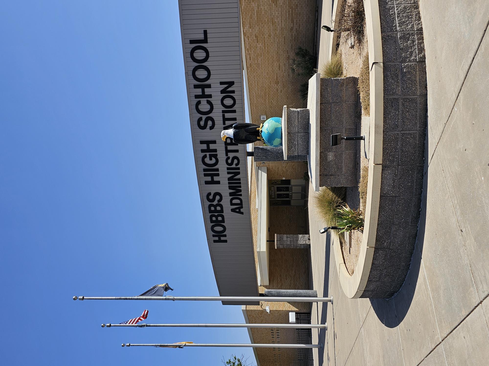 Hobbs High School Administration Building with Eagle and Flag Poles with Flags