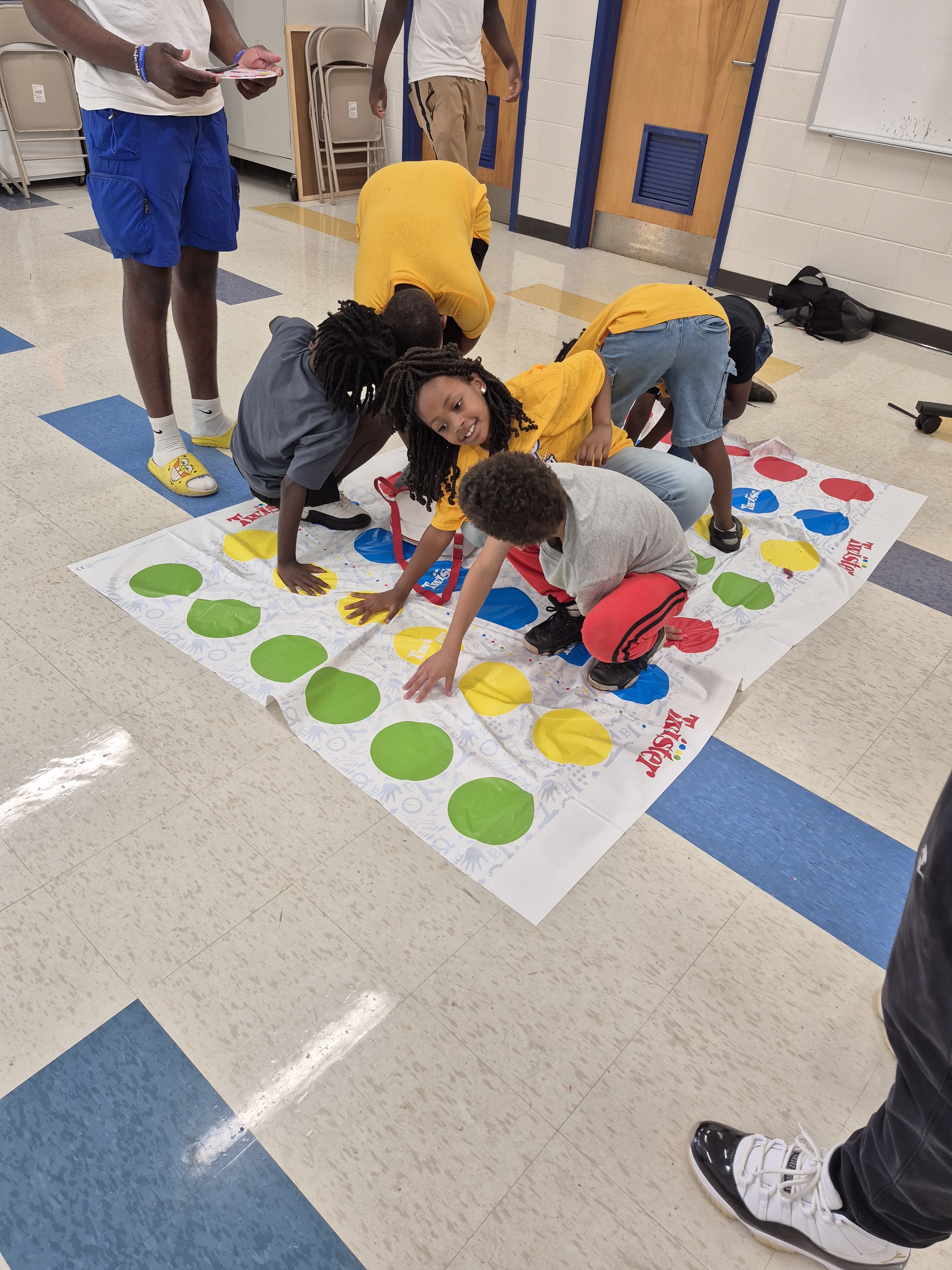 Students playing Twister