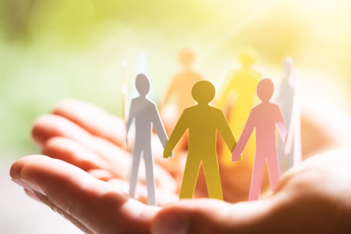Paper People Cut Outs Inside Open Hands