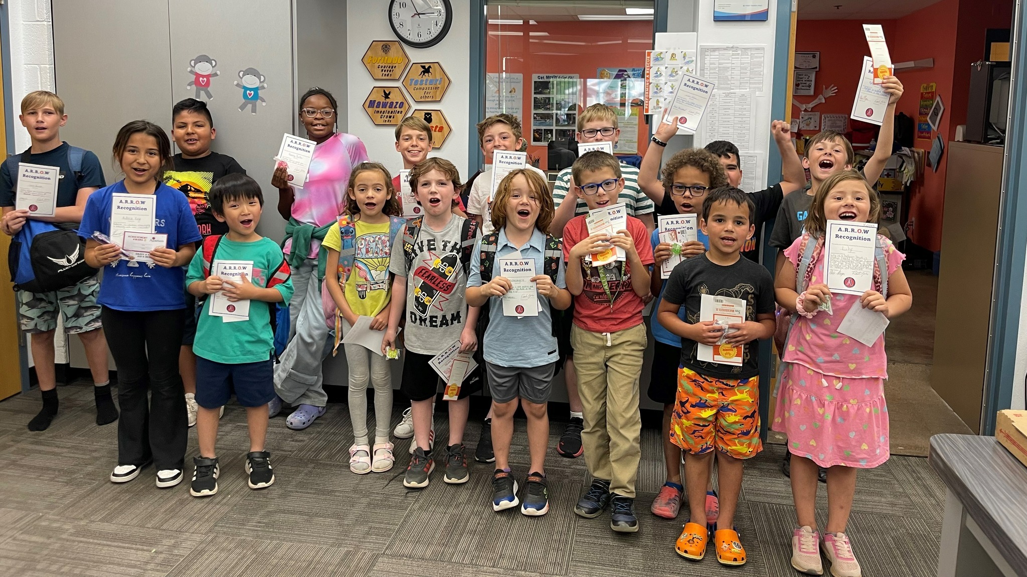 Students posing after being recognized