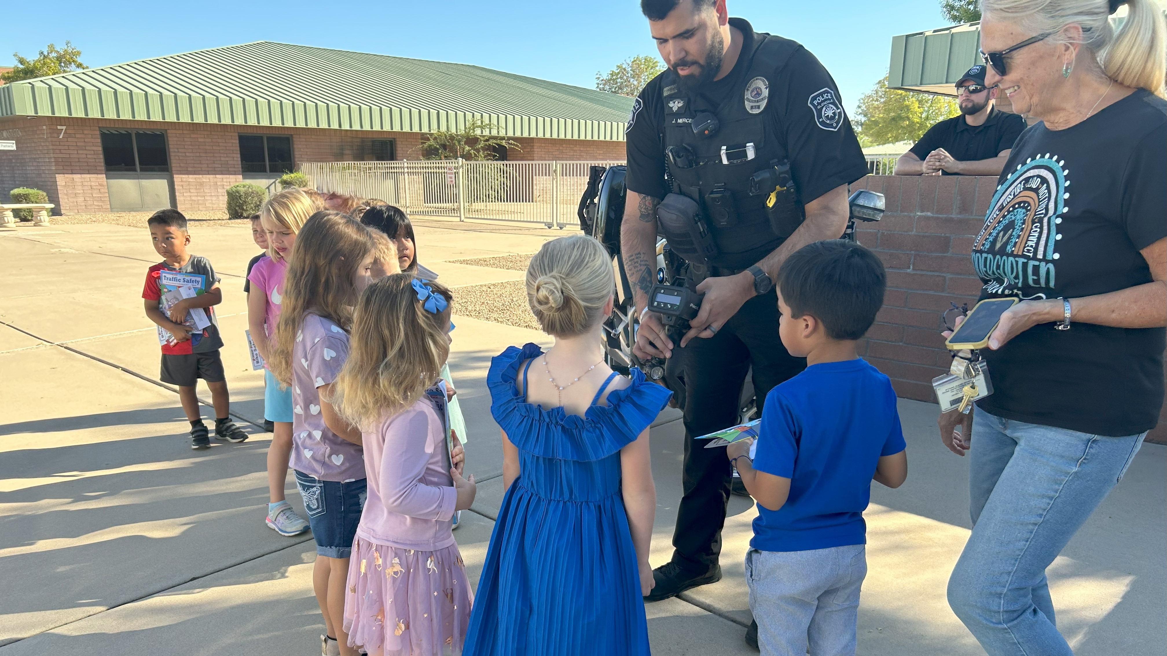 Officers talking to students about vaping