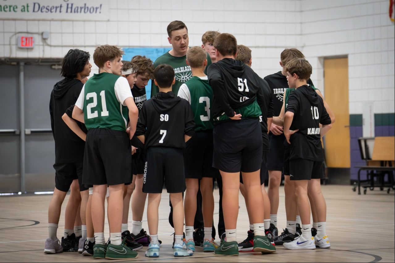 Student athletes in a huddle