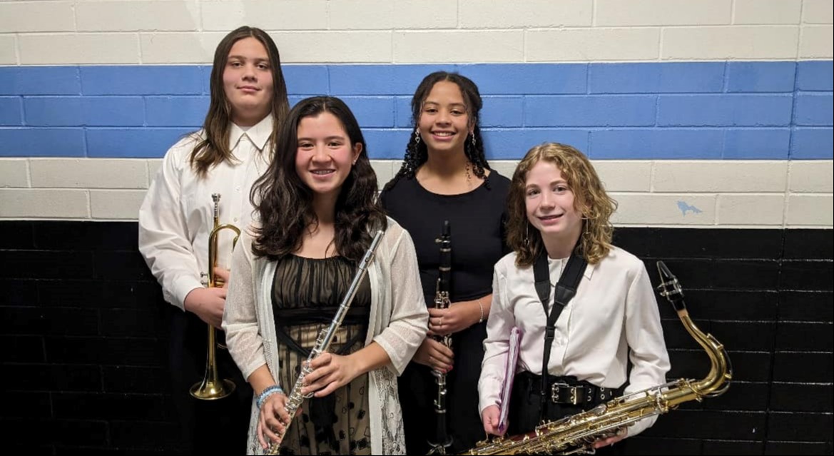 Students holding instruments