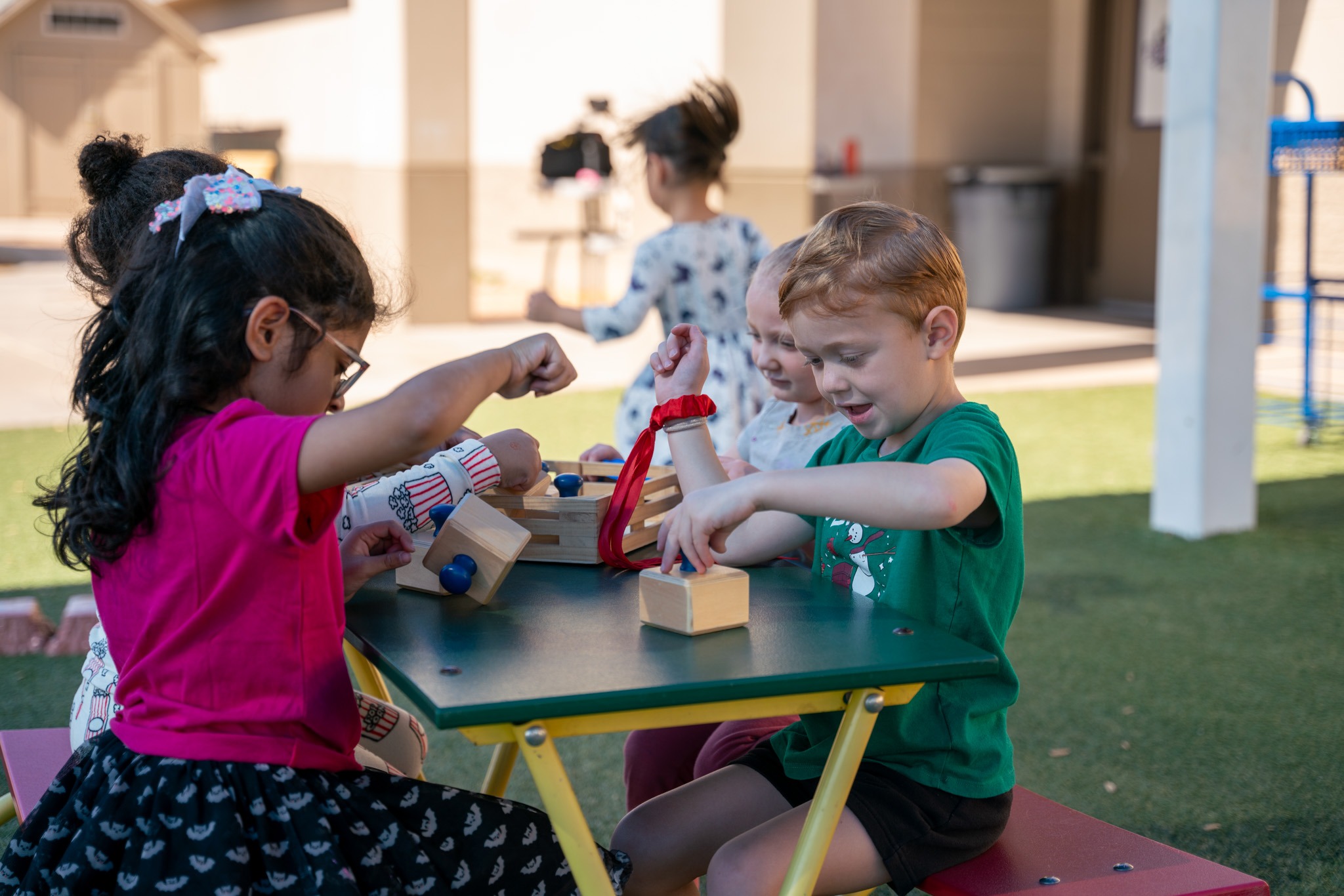 preschoolers playing outside