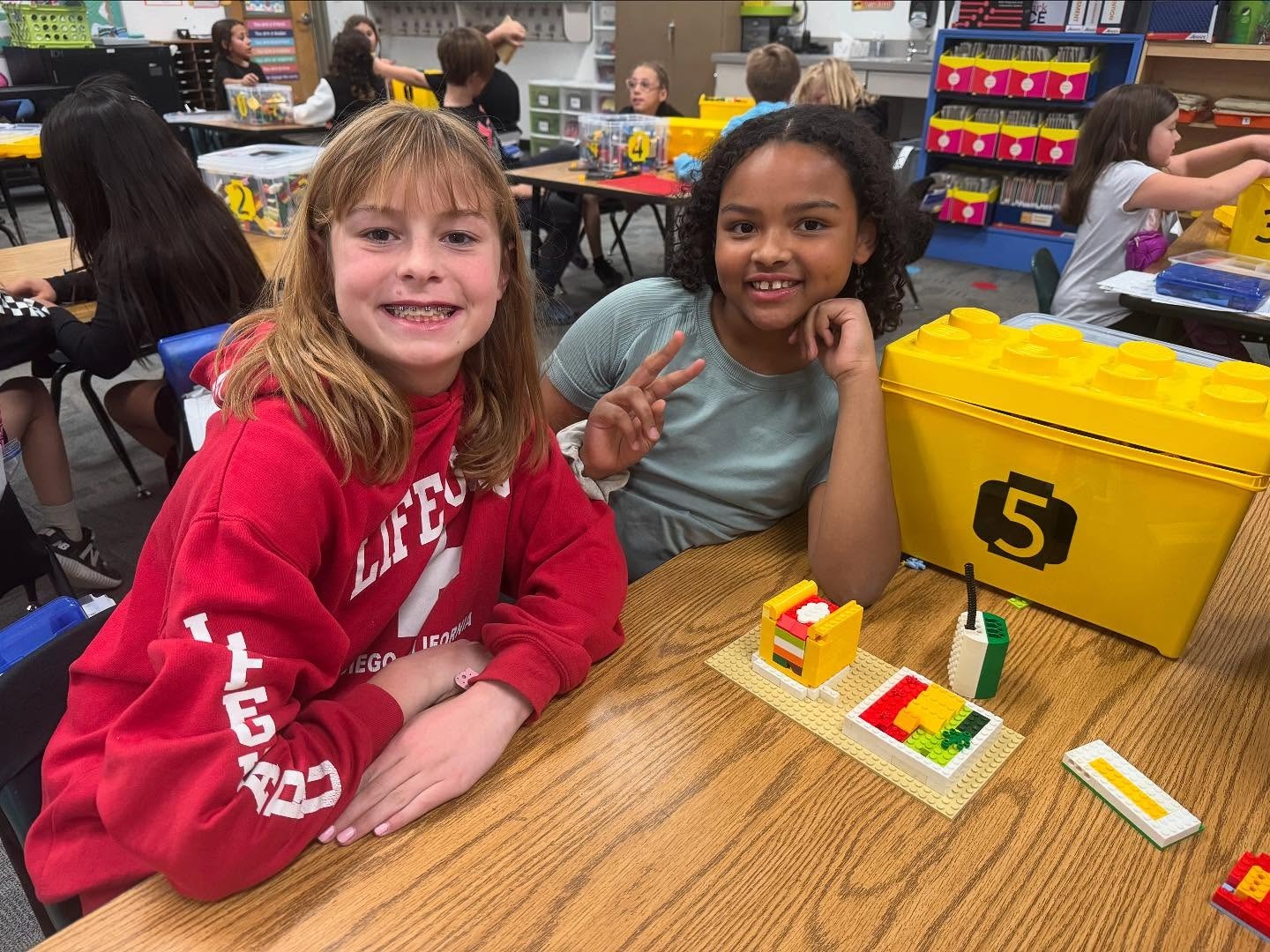 students learning with Legos