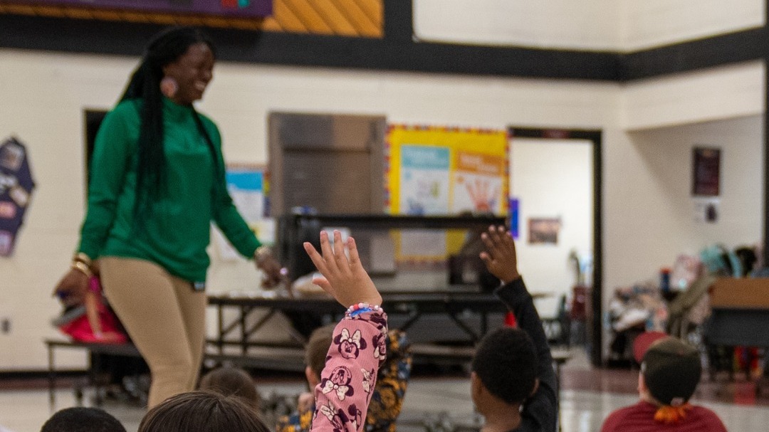 City of Peoria staff with kids in a multipurpose room