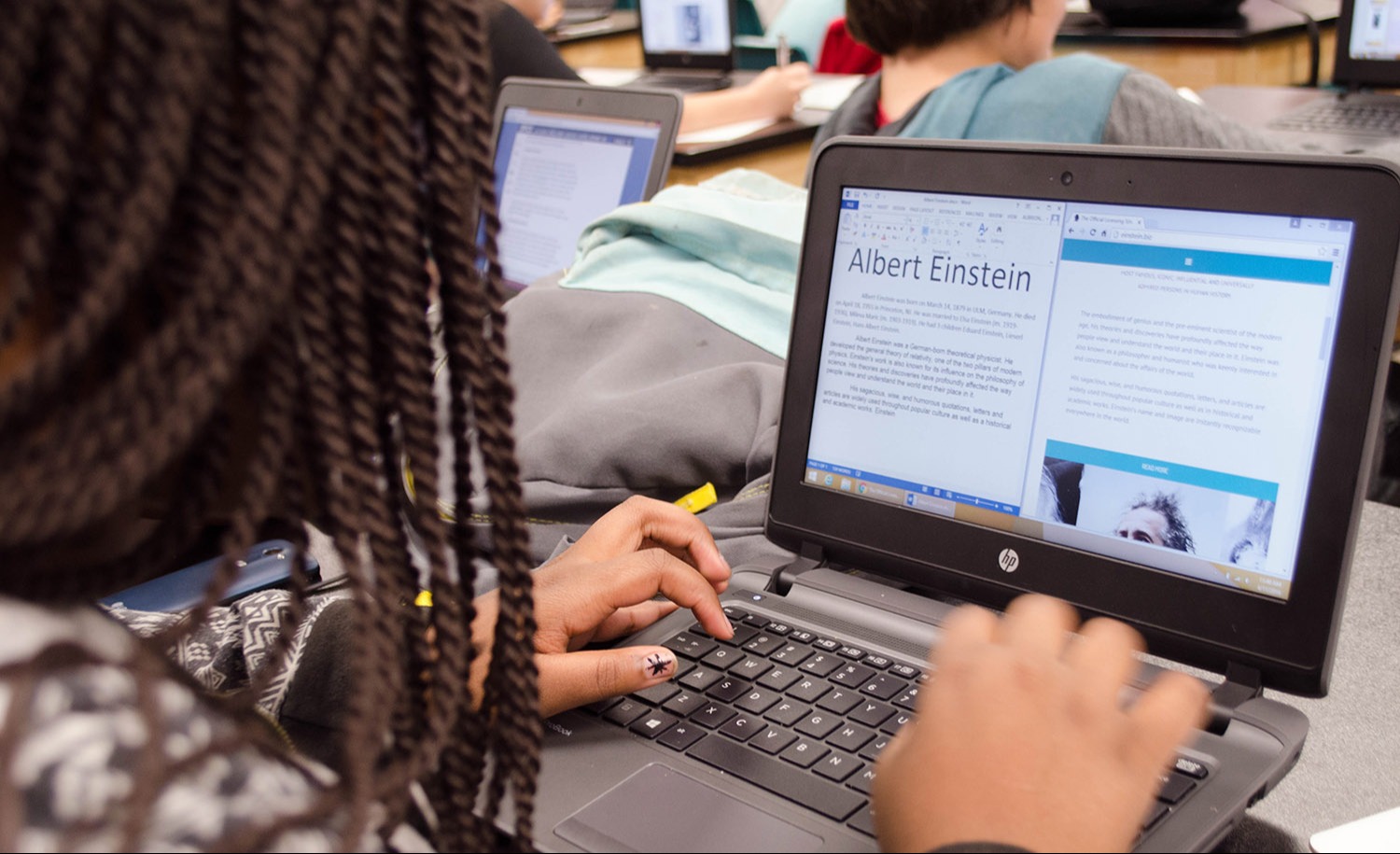 Picture of a student working on a laptop