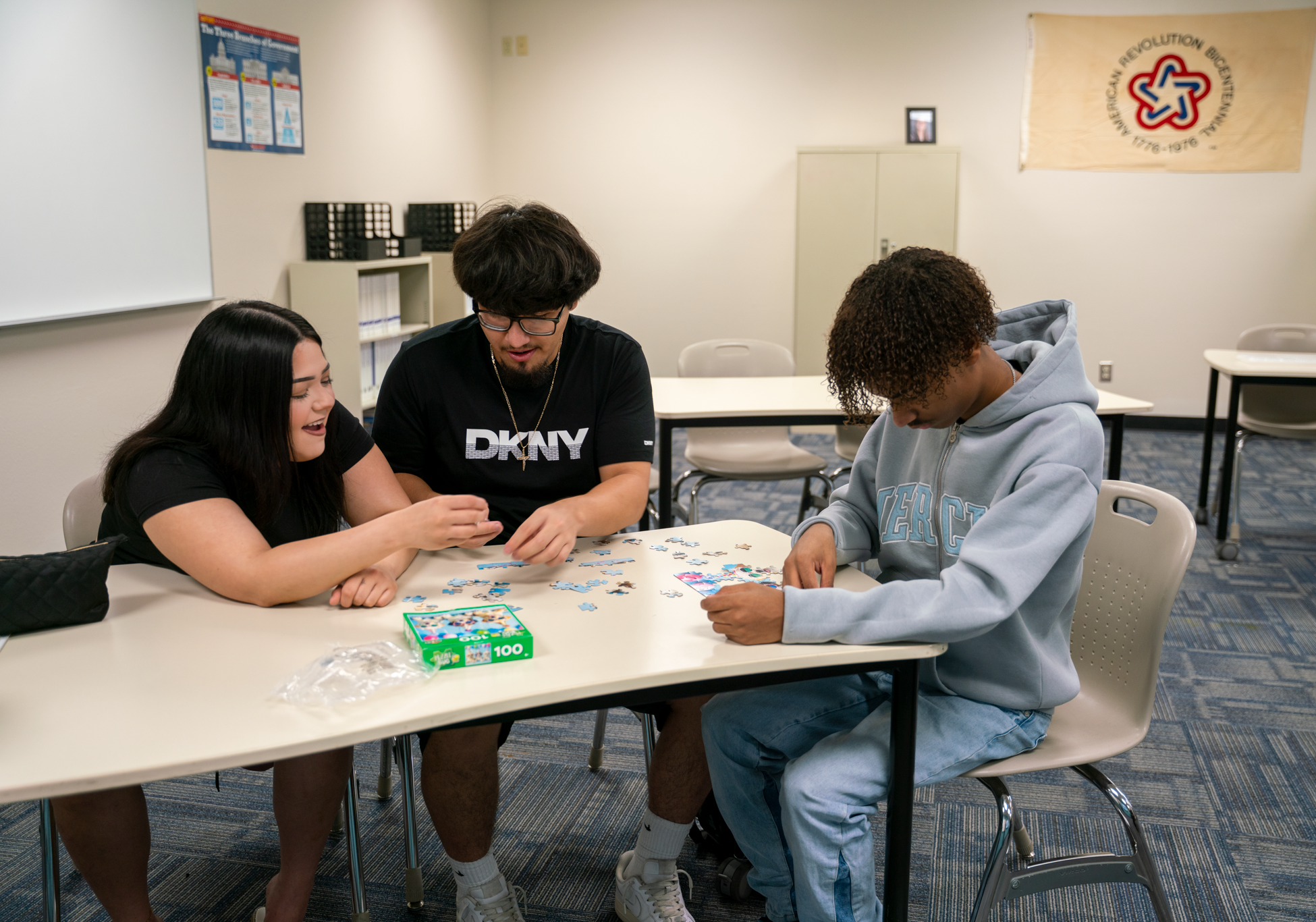 Students working on a Puzzle