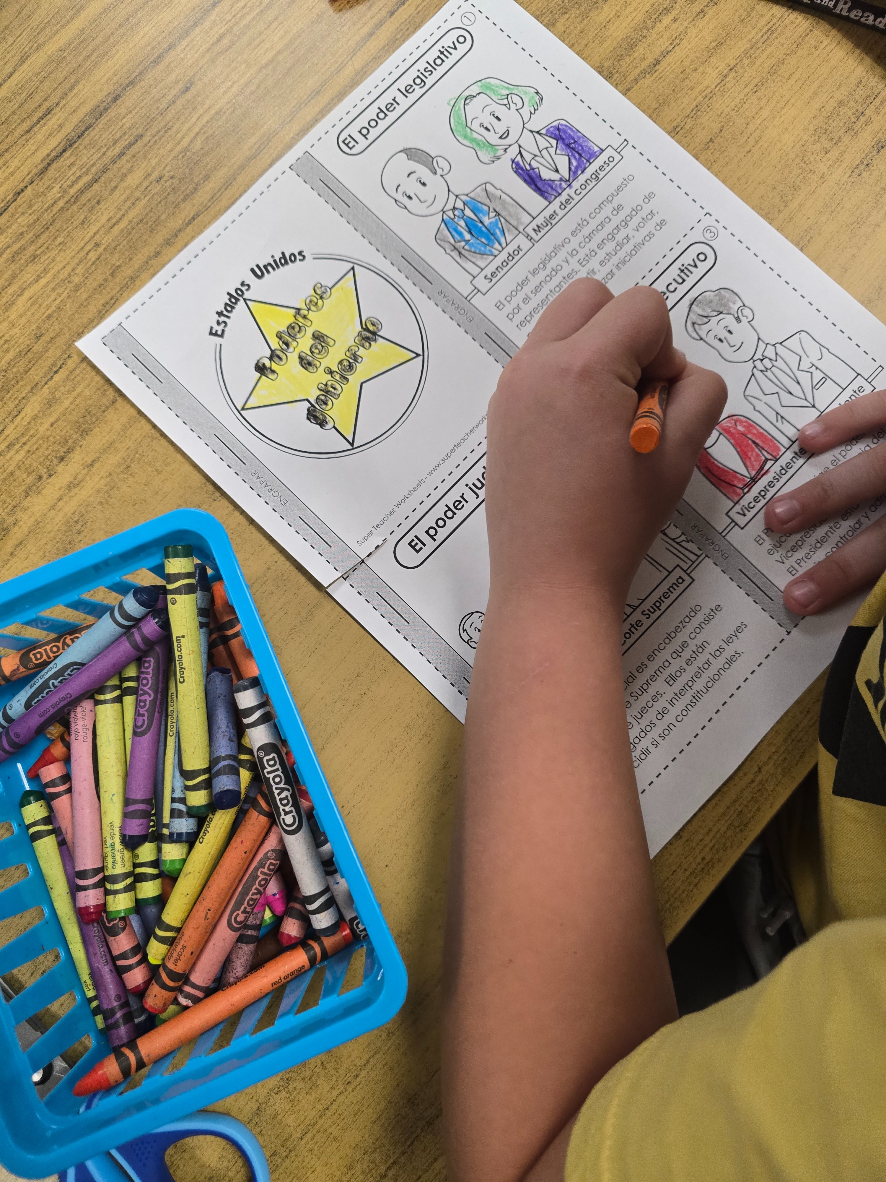 Student working on a project in Spanish